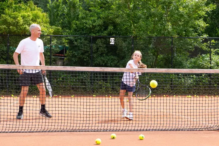 Player during a tennis session at 359.tennis in Amstelveen